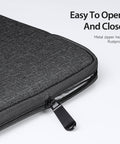 Slim black laptop sleeve with secure fit for 13-inch devices.