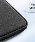 Black 13-inch laptop sleeve with 360° protection and lightweight design.